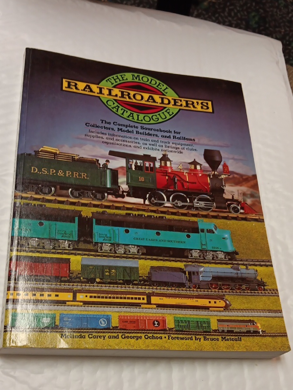 The Model Railroader's Catalogue - Colorful Train Illustration